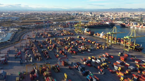 Valencia-harbour-commercial-dock-full-of-containers-Spain-aerial-trucks-loading